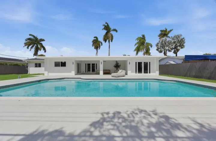 Pool and back of the renovated house