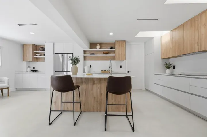 Kitchen island with wood base and leather stools